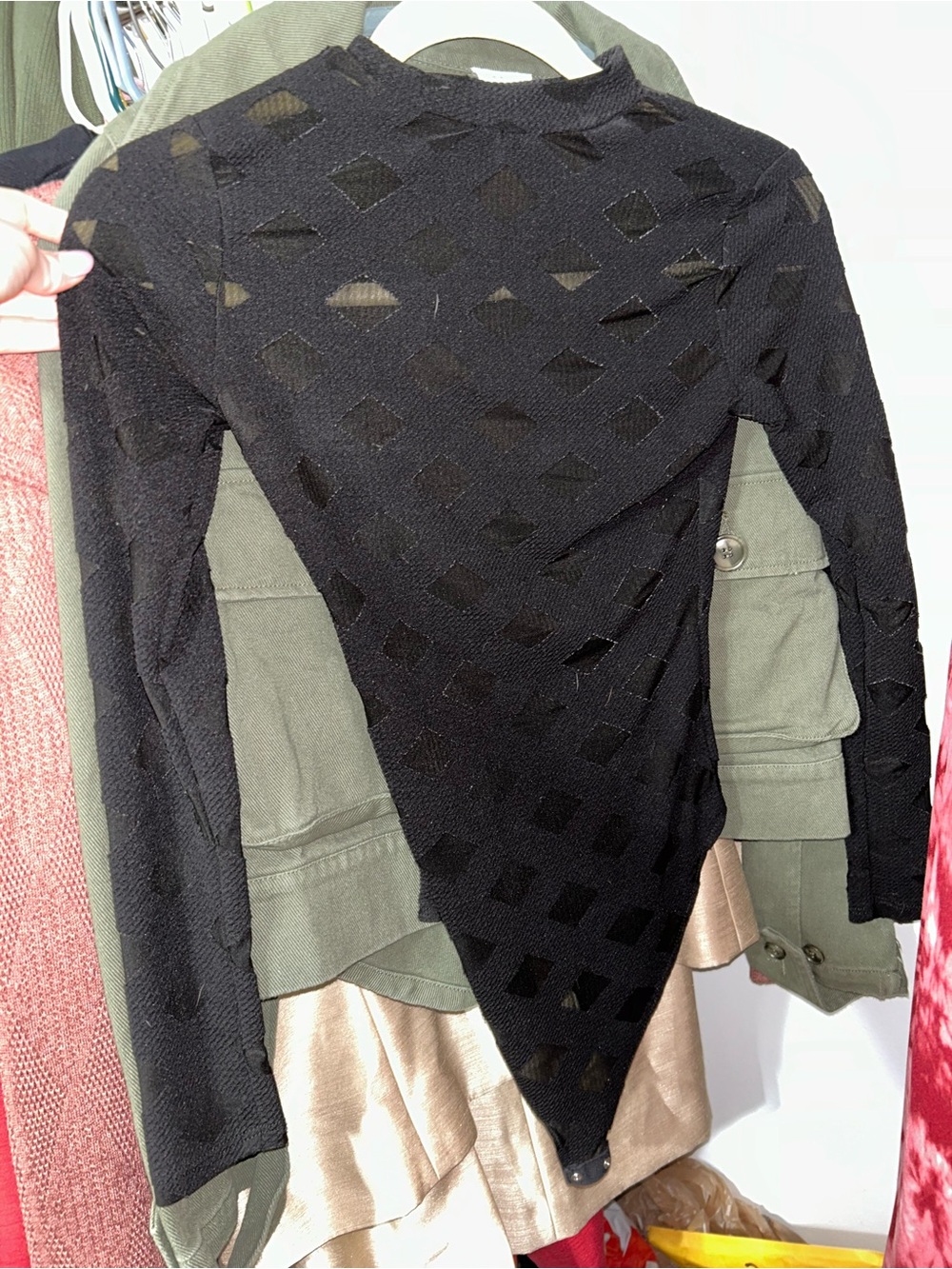 Black bodysuit with mesh cutouts